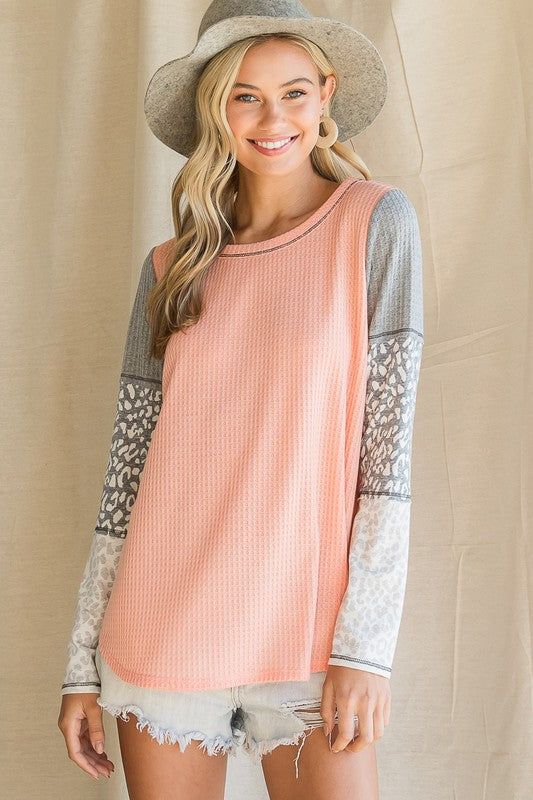 COULD BE DREAMING Melon waffle knit top.