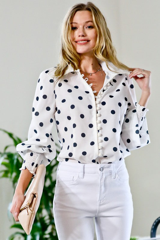 white polka dot blouse