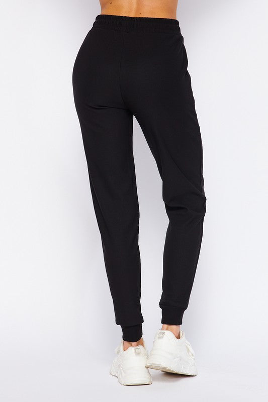 RUN AROUND Black joggers – Root & Flowers Boutique