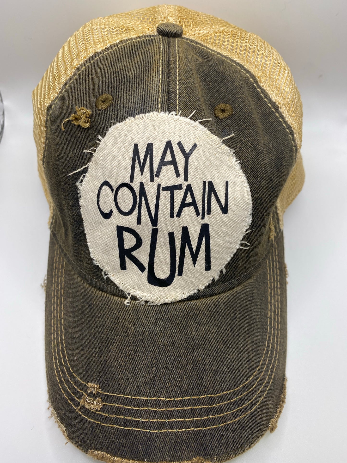 MAY CONTAIN RUM Trucker hat